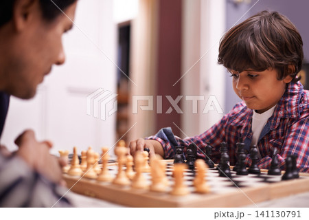 Child, father and chess strategy or planning checkmate move with knight, king or queen. Son, parent and thinking for competition learning or decision thoughts for playing, contest or problem solving 141130791