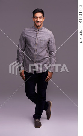 Professional, fashion and portrait of business man in studio with company pride, confidence and smile. Creative startup, agency and happy isolated person for career, work and job on gray background Professional, fashion and portrait of business man in studio with company pride, confidence and smile. Creative startup, agency and happy isolated person for career, work and job on gray background 141131213