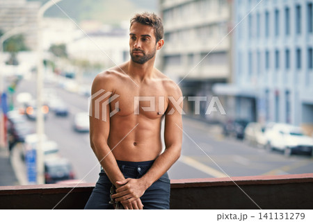 Man, sexy and shirtless with muscle on balcony with confidence or pride, relax and thinking on vacation in morning. Male person, topless and strong in city with abs, fit and outside in San Francisco Man, sexy and shirtless with muscle on balcony with confidence or pride, relax and thinking on vacation in morning. Male person, topless and strong in city with abs, fit and outside in San Francisco 141131279