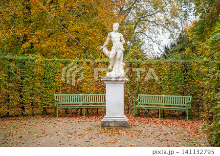 Statue and Benches in Autumn Garden Sanssouci in Potsdam, Germany Statue and Benches in Autumn Garden Sanssouci in Potsdam, Germany 141132795