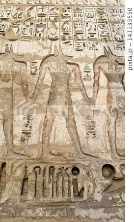Beautiful bas-reliefs and ancient hieroglyphs from the mortuary temple of Ramesses III at Medinet Habu, Luxor, Egypt. 141133550