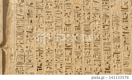 Beautiful bas-reliefs and ancient hieroglyphs from the mortuary temple of Ramesses III at Medinet Habu, Luxor, Egypt. Beautiful bas-reliefs and ancient hieroglyphs from the mortuary temple of Ramesses III at Medinet Habu, Luxor, Egypt. 141133578