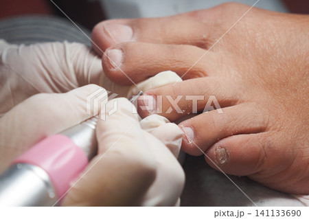 Pedicure session at a nail salon on a weekday 141133690