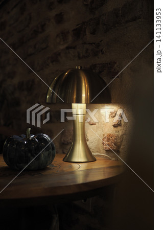 Lighting and decoration in a cozy indoor space Lighting and decoration in a cozy indoor space 141133953