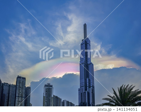 A tall building with a rainbow on top A tall building with a rainbow on top 141134051