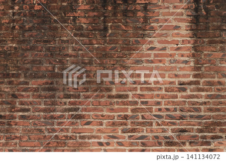 A brick wall with a brown color A brick wall with a brown color 141134072