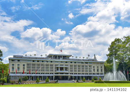 Large building with a fountain in front of it Large building with a fountain in front of it 141134102
