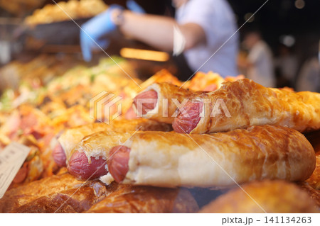 Delicious baked goods at a bustling bakery 141134263