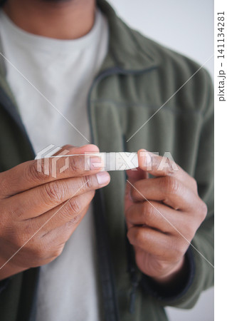 closeup of a man hand measuring diabetic  141134281