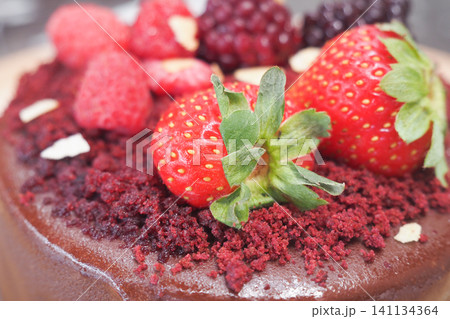 Delicious dessert with berries and chocolate decoration 141134364