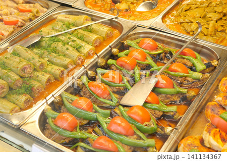 Delicious dishes on display at a local market stall Delicious dishes on display at a local market stall 141134367