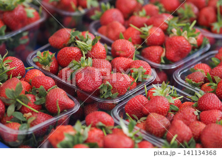 Fresh strawberries on display at the market in summer 141134368