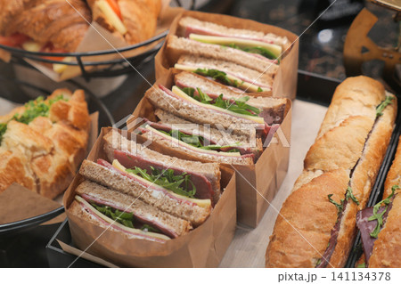 Lunch sandwiches arranged in boxes for easy serving 141134378