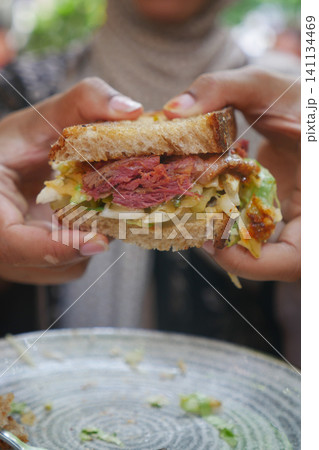 Delicious sandwich served at a local eatery in the afternoon Delicious sandwich served at a local eatery in the afternoon 141134469