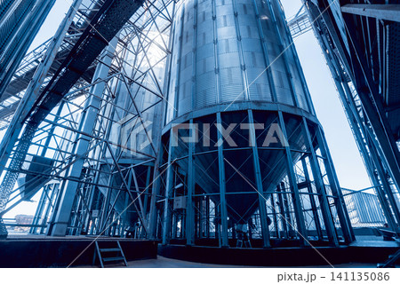 Modern silos for storing grain harvest. Agriculture. 141135086