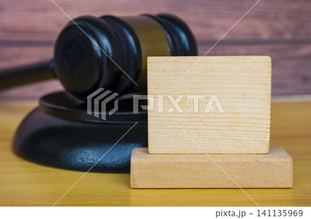 lack Wooden Gavel with Blank Square Sign Board on Wood Table Legal Concept lack Wooden Gavel with Blank Square Sign Board on Wood Table Legal Concept 141135969
