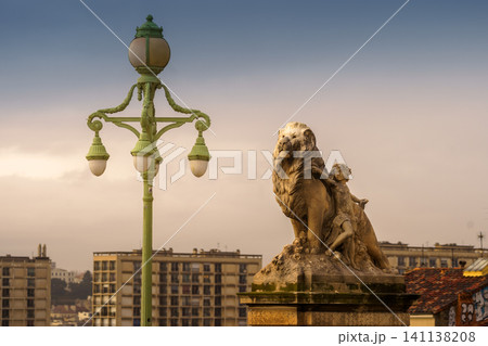 MARSEILLE, FRANCE - 10 Nov 2018 - Lion statue of the stairs decoration near the Saint Charles train station in Marseille MARSEILLE, FRANCE - 10 Nov 2018 - Lion statue of the stairs decoration near the Saint Charles train station in Marseille 141138208