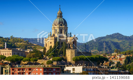 Panoramic top view of the local buildings with the trees, mountains and the sky in the beautiful city of Messina, Sicily, Italy Panoramic top view of the local buildings with the trees, mountains and the sky in the beautiful city of Messina, Sicily, Italy 141139088