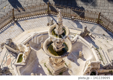 MESSINA, ITALY - NOVEMBER 06, 2018 - Top view on the fountain of Orion on Piazza del Duomo and its details and elements MESSINA, ITALY - NOVEMBER 06, 2018 - Top view on the fountain of Orion on Piazza del Duomo and its details and elements 141139095
