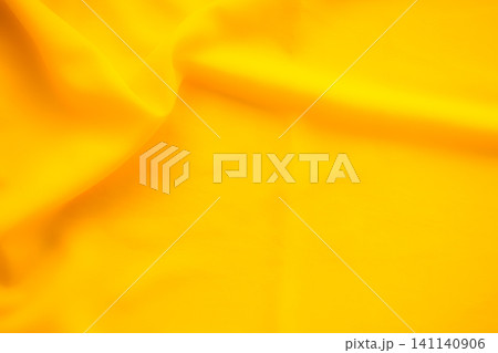 Yellow background cloth fabric orange color gradient texture pattern silk wave banner gold, fashion material backdrop poster for summer tropical travel holidays, satin mockup luxury premium. Yellow background cloth fabric orange color gradient texture pattern silk wave banner gold, fashion material backdrop poster for summer tropical travel holidays, satin mockup luxury premium. 141140906