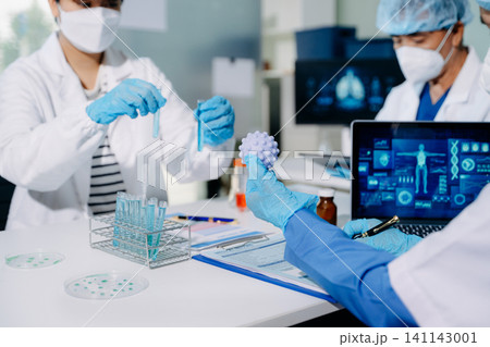 Scientists conducting laboratory research, analyzing samples in a biotech lab. Healthcare innovation, medical testing, and advanced science technology Scientists conducting laboratory research, analyzing samples in a biotech lab. Healthcare innovation, medical testing, and advanced science technology 141143001