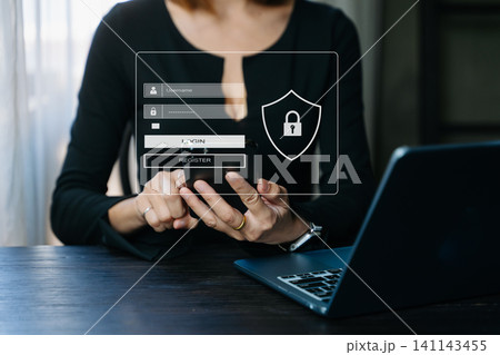 Cyber security concept, Login, User, identification information security and encryption, secure access to user's personal information woman using smart phone and tablet in office Cyber security concept, Login, User, identification information security and encryption, secure access to user's personal information woman using smart phone and tablet in office 141143455