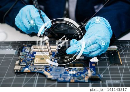 technician soldering microchip on circuit board, highlighting precision electronics repair, hardware maintenance, and advanced technology work. technician soldering microchip on circuit board, highlighting precision electronics repair, hardware maintenance, and advanced technology work. 141143817