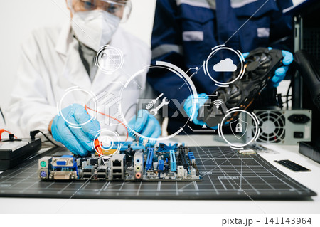 The technician is putting the CPU on the socket of the computer motherboard. electronic engineering electronic repair, electronics measuring 141143964