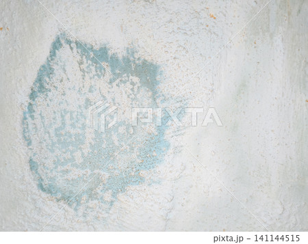 Abstract background of a weathered and distressed wall with peeling paint and plaster in faded light blue and beige tones, showcasing aged texture and grunge details. Abstract background of a weathered and distressed wall with peeling paint and plaster in faded light blue and beige tones, showcasing aged texture and grunge details. 141144515