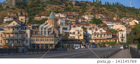 Old Tbilisi panorama with Meidan square and Surb Gevorg church at sunset Old Tbilisi panorama with Meidan square and Surb Gevorg church at sunset 141145769