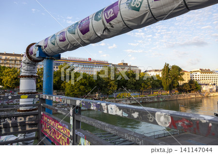 Vienna, Austria - June 13, 2023: Embankment the Danube Canal in Vienna Vienna, Austria - June 13, 2023: Embankment the Danube Canal in Vienna 141147044