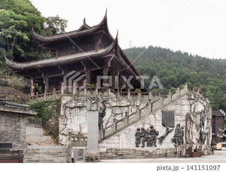 The iconic multi-tiered wooden pavilions and Jiuli Palace structures of Chiyou Jiuli City, China's largest traditional Miao ethnic group architectural complex in Pengshui County. 141151097