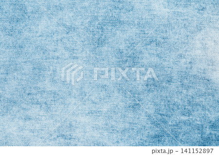 Light blue acid wash denim fabric texture background Light blue acid wash denim fabric texture background 141152897