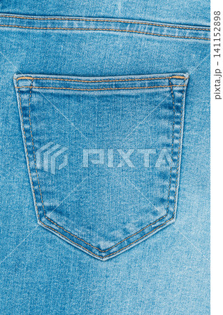 Blue denim jeans back pocket with yellow stitching close up Blue denim jeans back pocket with yellow stitching close up 141152898