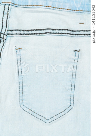Close up of light blue denim pocket with contrast stitching Close up of light blue denim pocket with contrast stitching 141153042