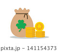 Gold Coins Stack and Money Bag with Shamrock 141154373