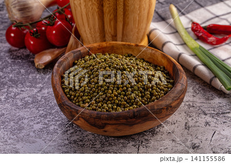 Mung beans in wooden bowl with fresh ingredients Mung beans in wooden bowl with fresh ingredients 141155586