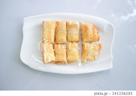 toast or bread with butter topping , toast bread or sliced bread with butter and sugar topping toast or bread with butter topping , toast bread or sliced bread with butter and sugar topping 141156285