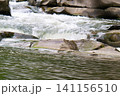 Mountain watercourse. Abundance of water, saving and use of water resources. 141156510