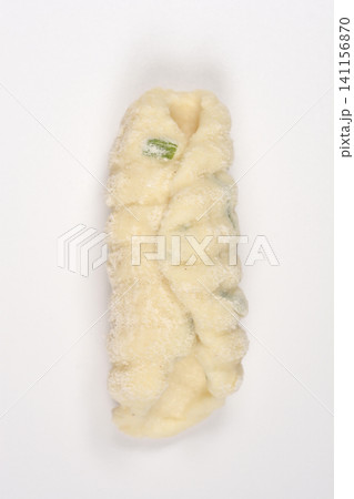 Single Piece of Raw Cottage Cheese Gnocchi with Chives Single Piece of Raw Cottage Cheese Gnocchi with Chives 141156870