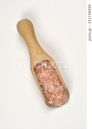 Pink Himalayan Salt Crystals in Wooden Scoop Pink Himalayan Salt Crystals in Wooden Scoop 141156894