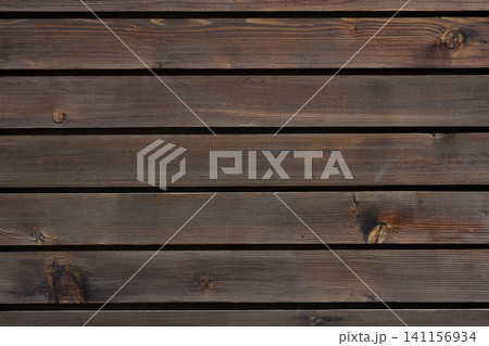 Macro texture of horizontal brown wooden planks background 141156934