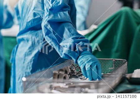 Hand, surgery and emergency tools in theatre or healthcare operation as medical staff, wellness or professional. Finger, utensils and anatomy service or help treatment as procedure, injury or scalpel 141157100