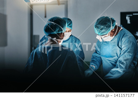 Surgeon team, people and operating room at hospital in scrubs, ppe and help for emergency healthcare procedure. Doctors, group and together in icu, medical surgery and services for wellness at clinic Surgeon team, people and operating room at hospital in scrubs, ppe and help for emergency healthcare procedure. Doctors, group and together in icu, medical surgery and services for wellness at clinic 141157177