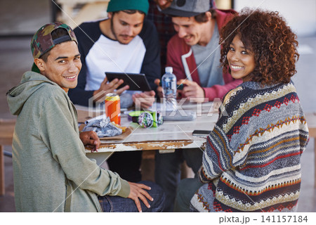 Portrait, table and university friends at study group with smile, hug and social support in education. Books, tablet and students relax together on patio with diversity, opportunity and college Portrait, table and university friends at study group with smile, hug and social support in education. Books, tablet and students relax together on patio with diversity, opportunity and college 141157184