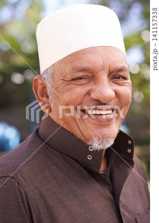 Happy, portrait and muslim man outdoor with a smile in garden to relax on holiday in retirement. Arab, person and travel on vacation in summer to park to enjoy nature or trees in backyard environment Happy, portrait and muslim man outdoor with a smile in garden to relax on holiday in retirement. Arab, person and travel on vacation in summer to park to enjoy nature or trees in backyard environment 141157338