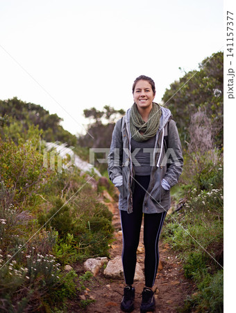Woman, hiking and happy in nature for portrait on path with fitness, outdoor or adventure on holiday. Girl, person and smile for trekking in bush, hill and rocks for journey on vacation in Cape Town Woman, hiking and happy in nature for portrait on path with fitness, outdoor or adventure on holiday. Girl, person and smile for trekking in bush, hill and rocks for journey on vacation in Cape Town 141157377