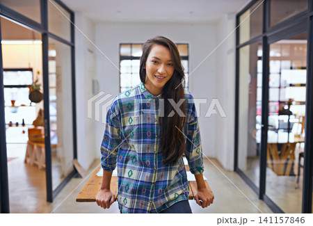Portrait, designer and business woman in office for startup, creative company or workplace. Entrepreneur, smile and young female person with confidence, professional and happiness for career Portrait, designer and business woman in office for startup, creative company or workplace. Entrepreneur, smile and young female person with confidence, professional and happiness for career 141157846