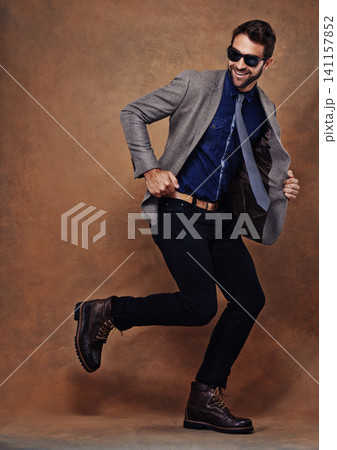 Fashion, pose and eyewear for male person, studio and business suit isolated on background. Confident, smile and corporate employee for happy man model, professional and glasses with trendy outfit Fashion, pose and eyewear for male person, studio and business suit isolated on background. Confident, smile and corporate employee for happy man model, professional and glasses with trendy outfit 141157852