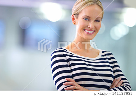 Portrait, arms crossed and happy business woman in office at startup company in Australia with bokeh or mockup space. Face, confidence and smile of creative professional, employee and proud editor Portrait, arms crossed and happy business woman in office at startup company in Australia with bokeh or mockup space. Face, confidence and smile of creative professional, employee and proud editor 141157953